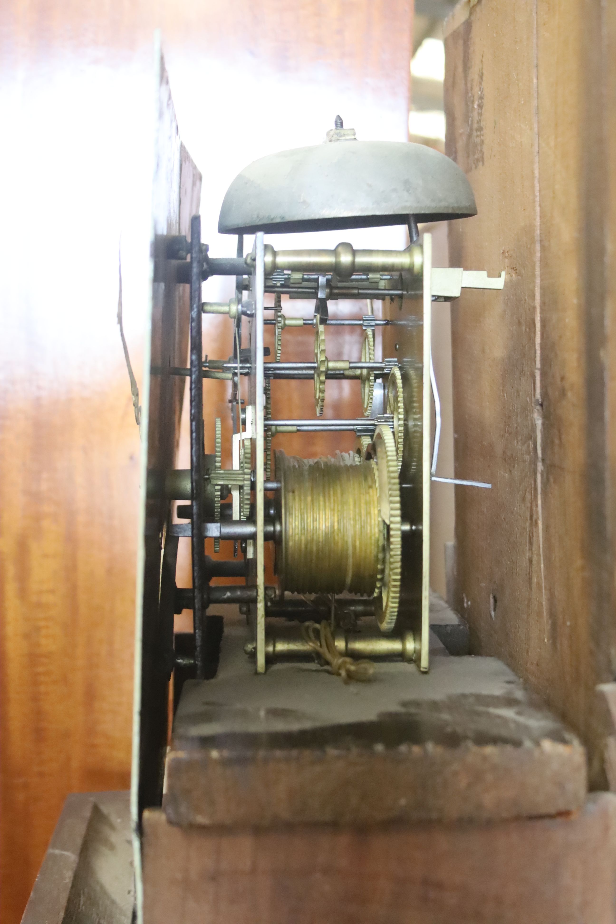 An early 19th century oak eight day longcase clock, marked Cousens Langport, height 194cm